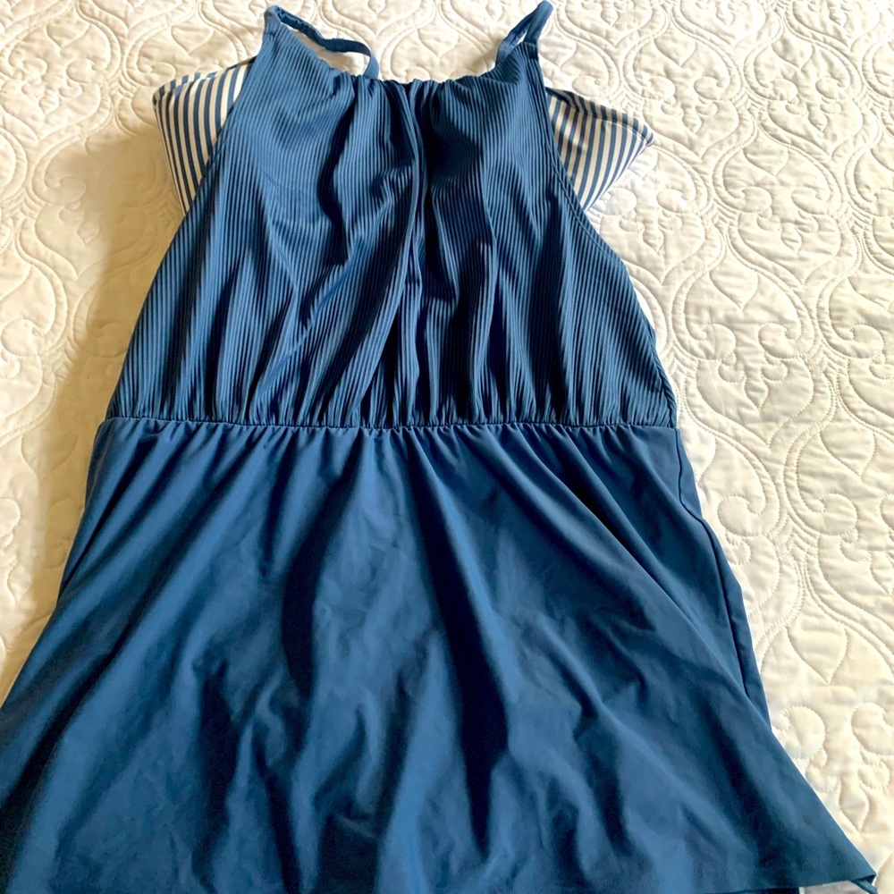Super cute Cacique by Lane Bryant 1 piece swimsuit with attached skirt.